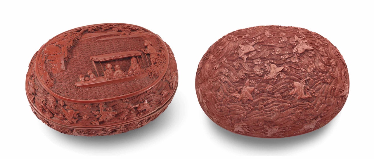 A CARVED CINNABAR LACQUER 'RED CLIFF' OVAL BOX AND COVER by Anonymous