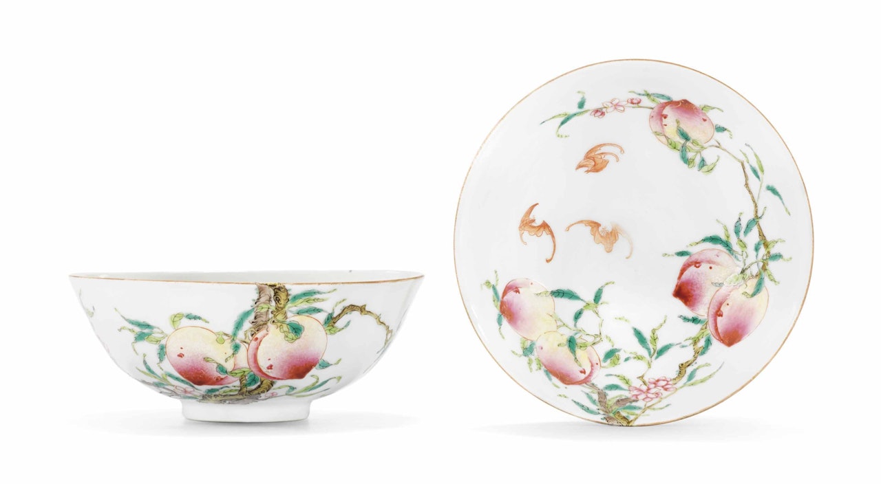 A PAIR OF FAMILLE ROSE 'BATS AND PEACHES' BOWLS by Anonymous