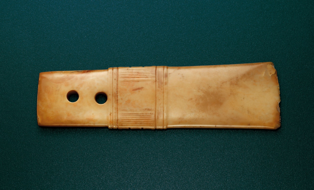 A JADE CEREMONIAL BLADE, GUI by Anonymous