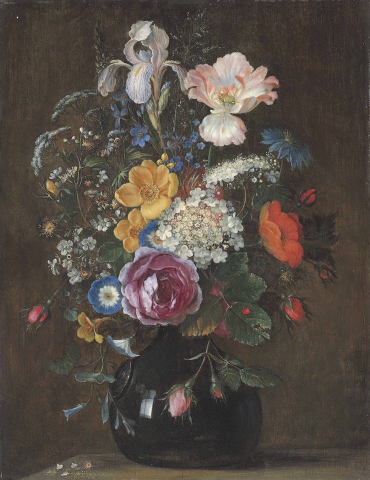 Flowers in a glass vase by Flemish School