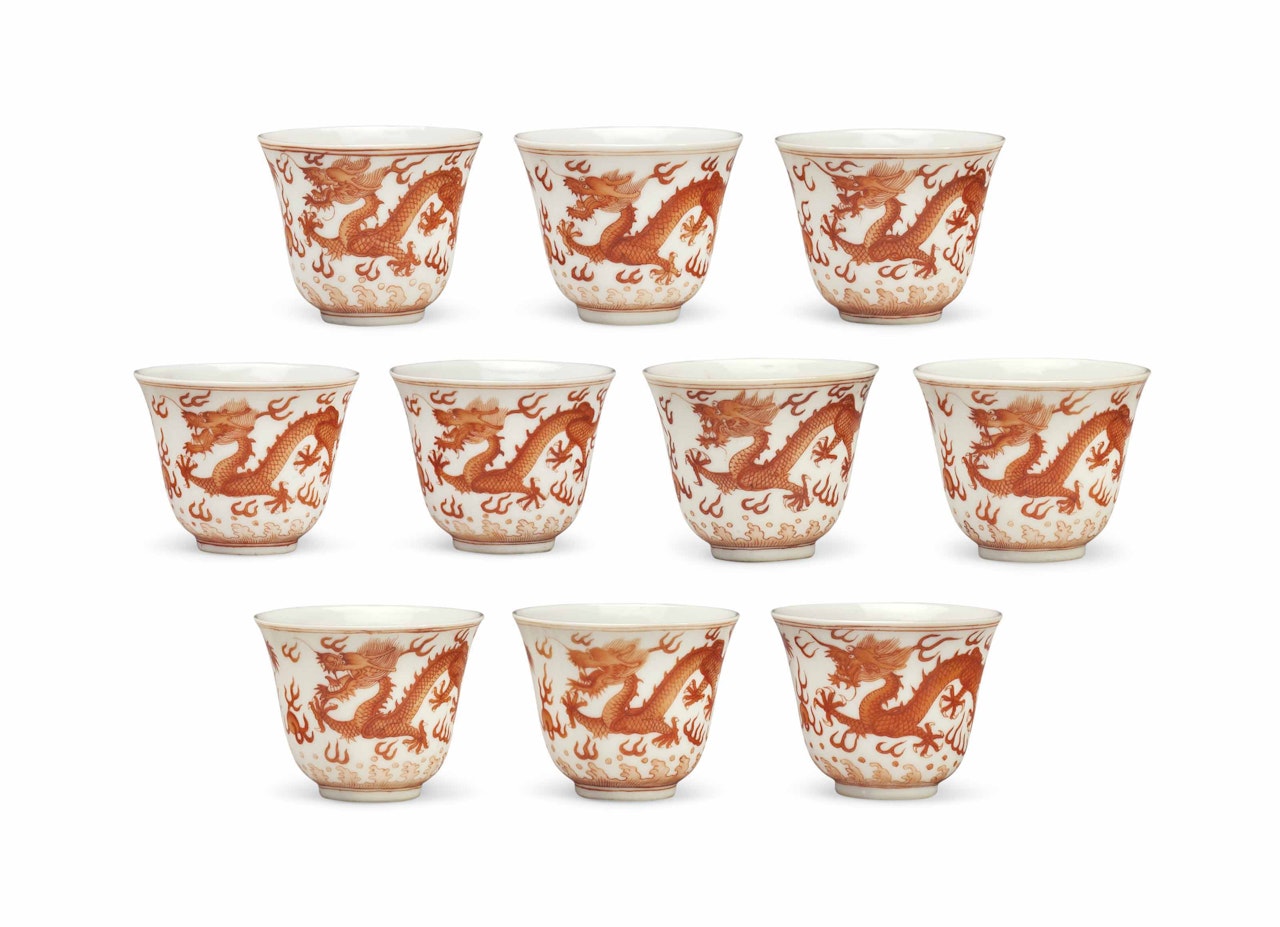A SET OF TEN IRON-RED-DECORATED 'DRAGON' WINE CUPS by Anonymous