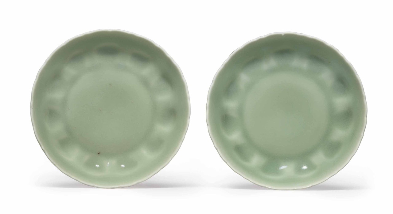 A RARE PAIR OF CELADON-GLAZED BRACKET-LOBED SAUCERS by Anonymous