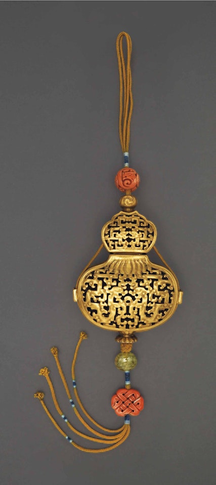 A RETICULATED FAUX GOLD PORCELAIN 'DOUBLE GOURD' POMANDER by Anonymous