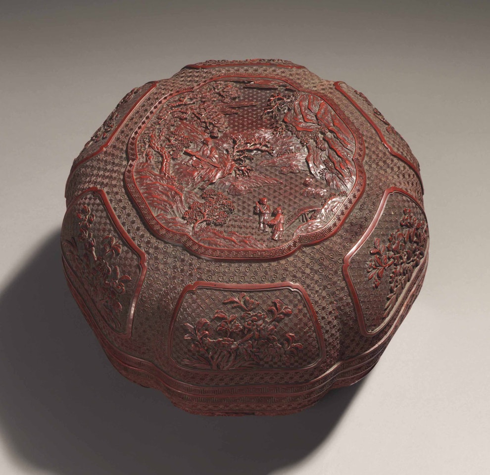 A CARVED CINNABAR LACQUER 'FIGURAL' LOBED BOX AND COVER by Anonymous