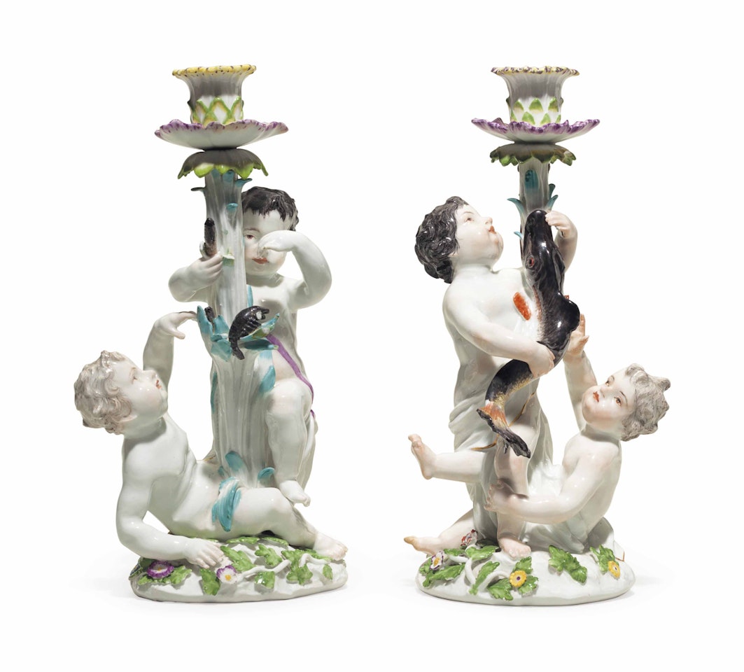 A PAIR OF MEISSEN PORCELAIN FIGURAL CANDLESTICKS EMBLEMATIC OF WATER by Anonymous