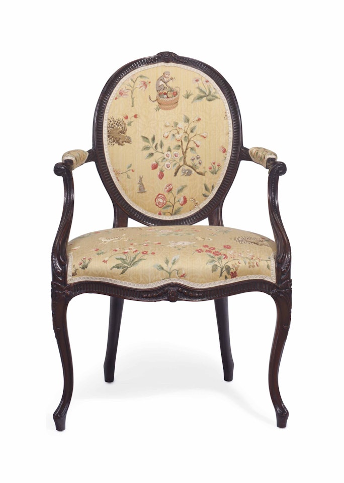 A GEORGE III SOLID MAHOGANY ARMCHAIR by Anonymous