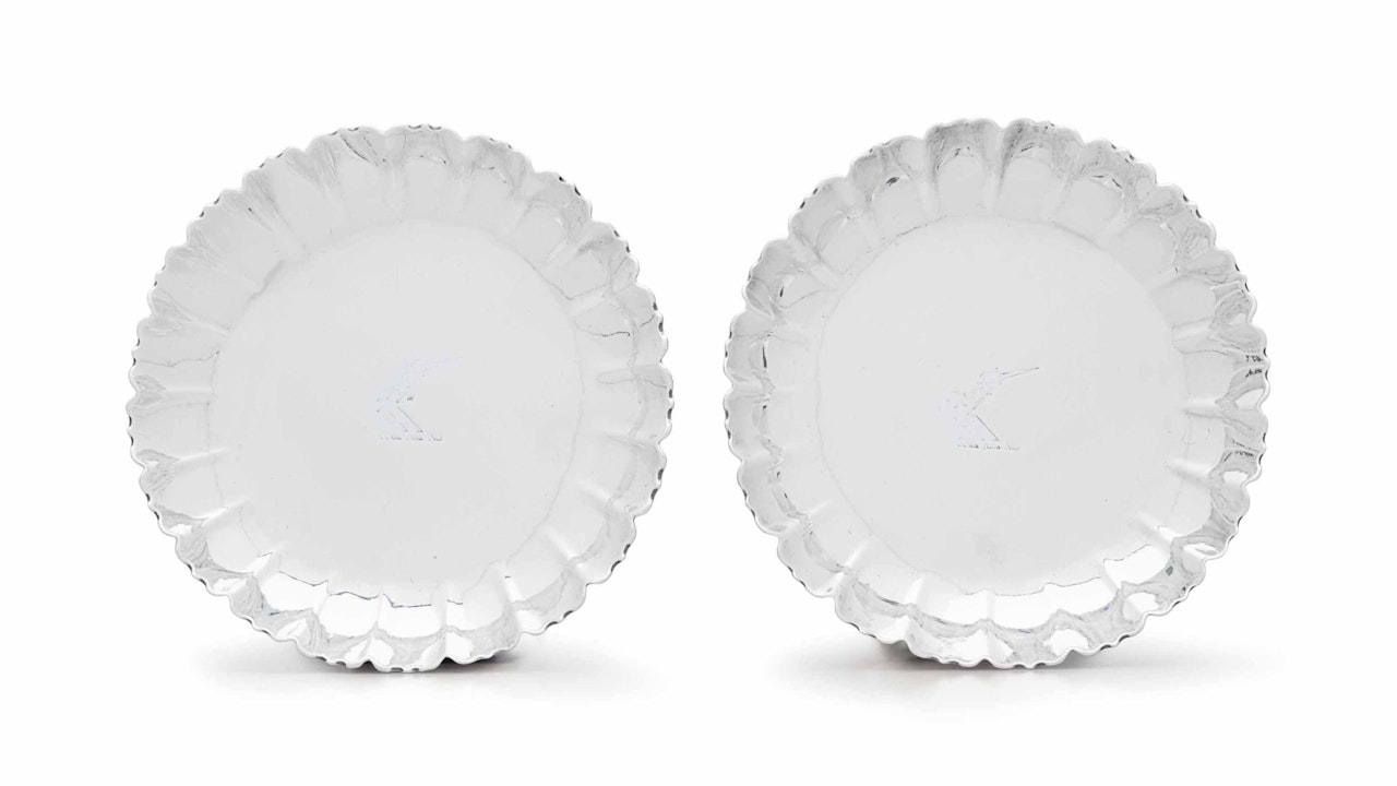 A PAIR OF GEORGE II IRISH SILVER SMALL STRAWBERRY DISHES by Anonymous