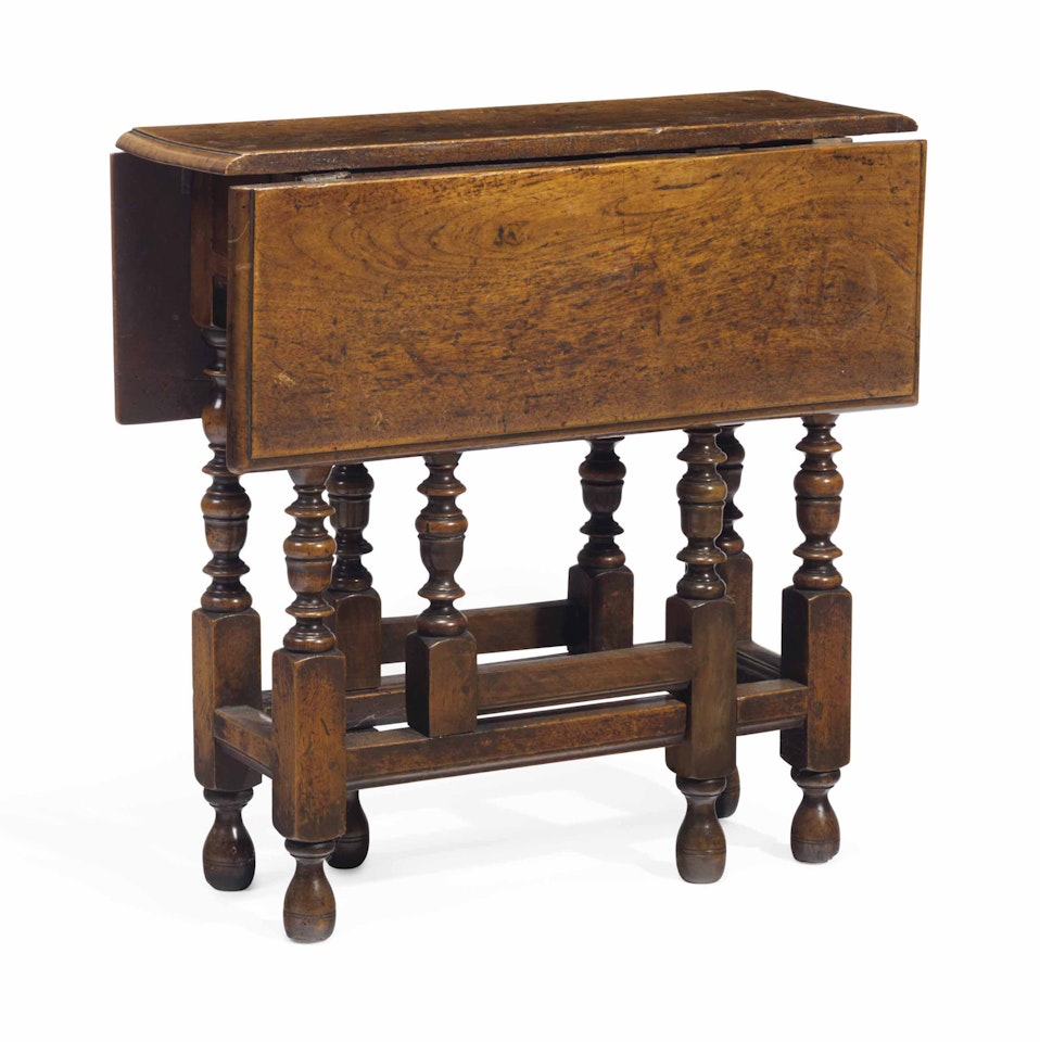 A WILLIAM AND MARY WALNUT GATE-LEG TABLE by Anonymous