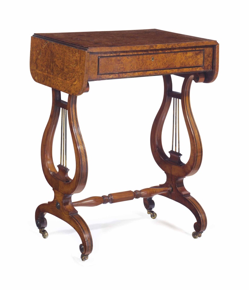 A REGENCY YEWWOOD AND TULIPWOOD-BANDED WORK TABLE by Anonymous