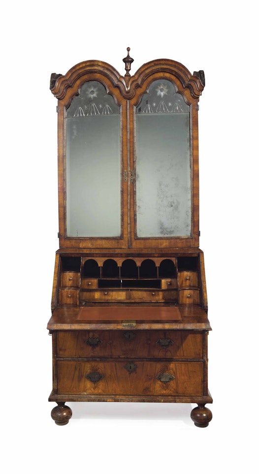 A QUEEN ANNE WALNUT DOUBLE-DOMED BUREAU-CABINET by Anonymous