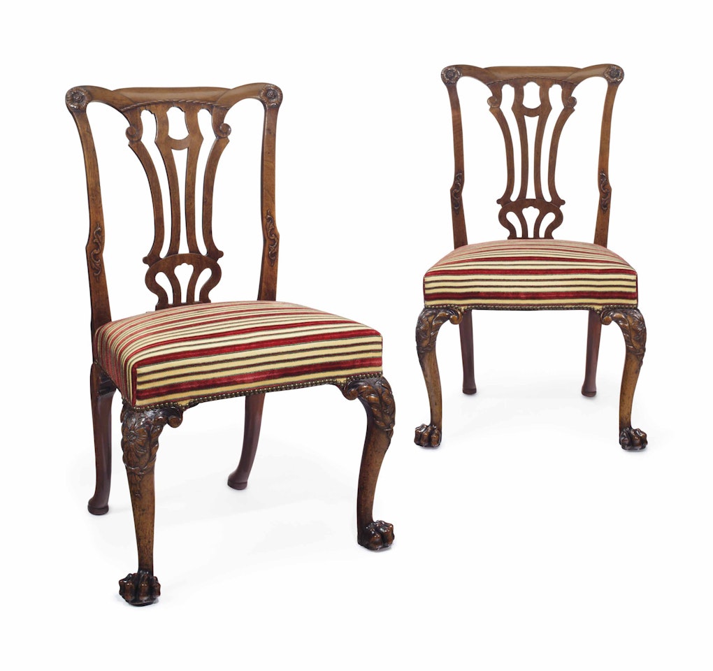 A PAIR OF IRISH GEORGE II WALNUT SIDE CHAIRS by Anonymous