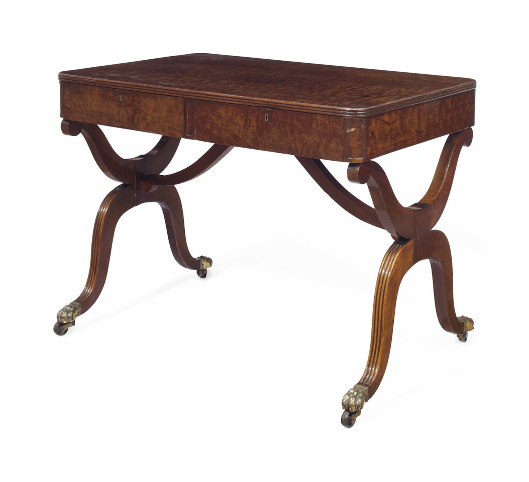 A GEORGE III PLUM PUDDING MAHOGANY WRITING TABLE by Anonymous