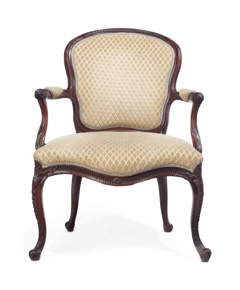 A GEORGE III SOLID MAHOGANY ARMCHAIR by Anonymous