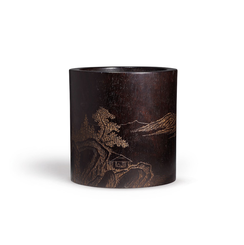 A CARVED AND INSCRIBED ZITAN BRUSH POT by Anonymous