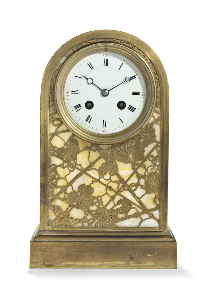 A 'GRAPE VINE' PATTERN MANTEL CLOCK by Tiffany Studios
