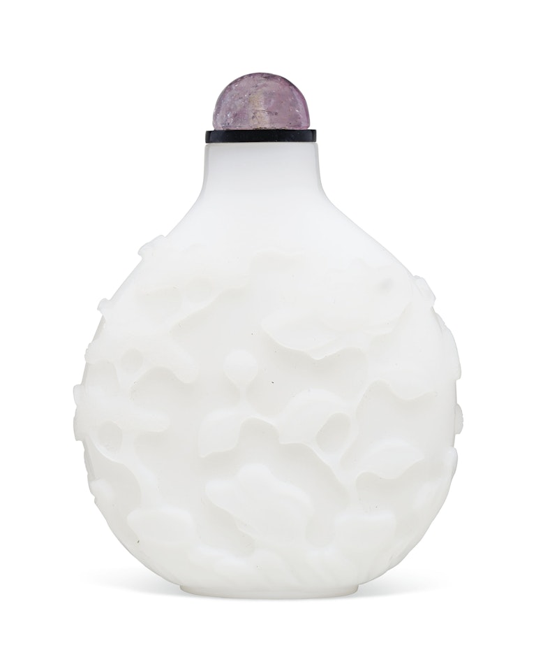 A CARVED OPAQUE WHITE GLASS SNUFF BOTTLE by Anonymous