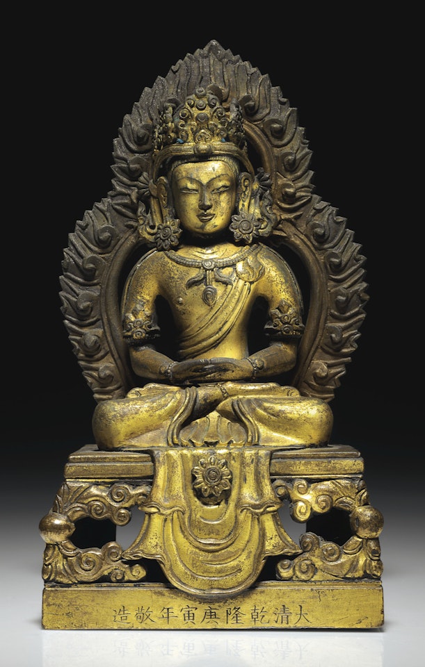 A GILT-BRONZE FIGURE OF AMITAYUS by Anonymous