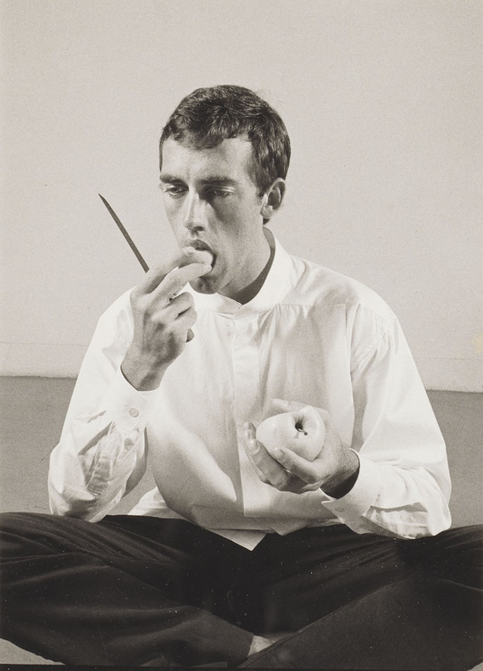 'Forbidden Fruit' (David Wojnarowicz Eating an Apple in an Issey Miyake shirt) from The Twelve Perfect Christmas Gifts from Dianne B. by Peter Hujar