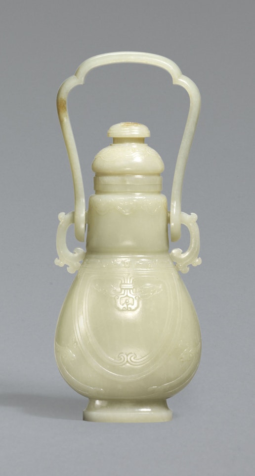 A PALE GREENISH-WHITE JADE ARCHAISTIC VASE AND COVER by Anonymous