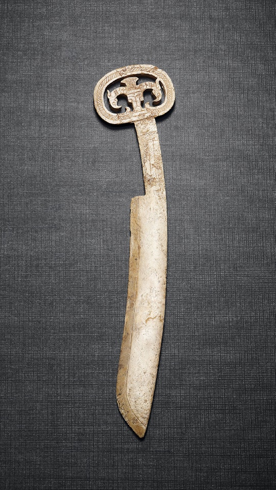 A JADE ‘PHOENIX’ CEREMONIAL KNIFE, XUEDAO by Anonymous