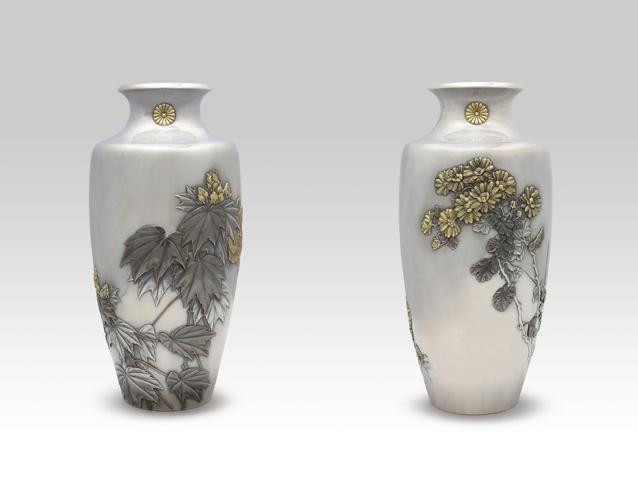 A pair of silver imperial presentation vases by Anonymous
