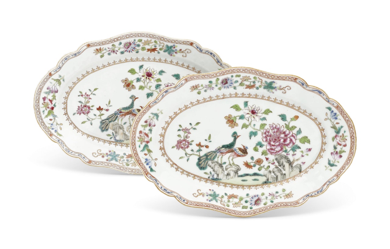 A SMALL PAIR OF FAMILLE ROSE PEACOCK OVAL PLATTERS by Anonymous