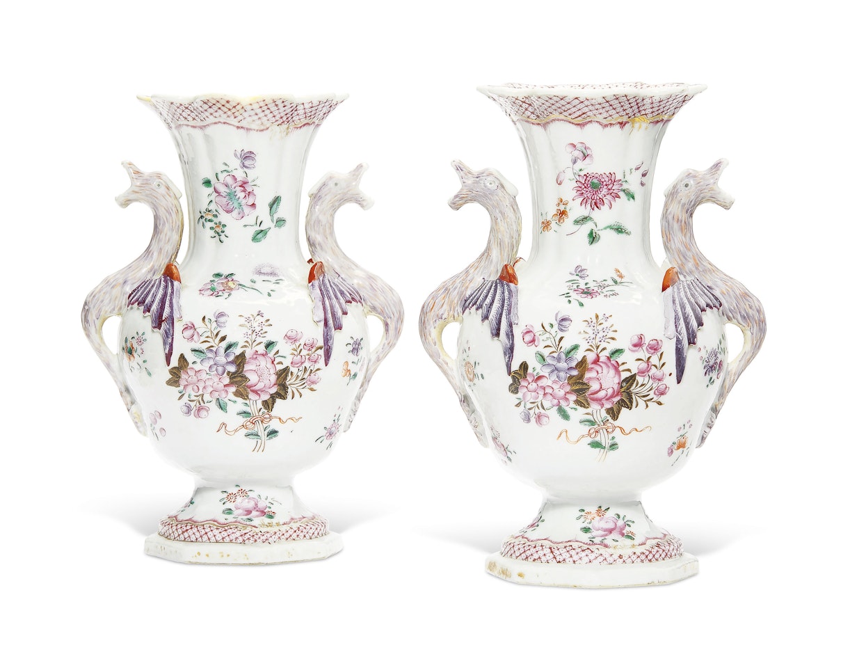 AN UNUSUAL PAIR OF FAMILLE ROSE TWO-HANDLED VASES by Anonymous