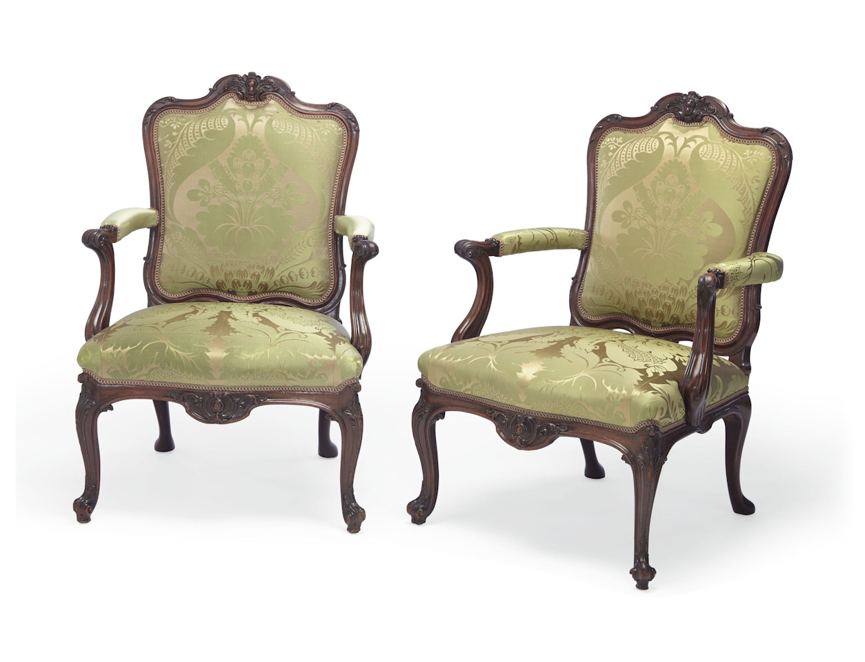 A PAIR OF EARLY GEORGE III SOLID MAHOGANY ARMCHAIRS by Anonymous