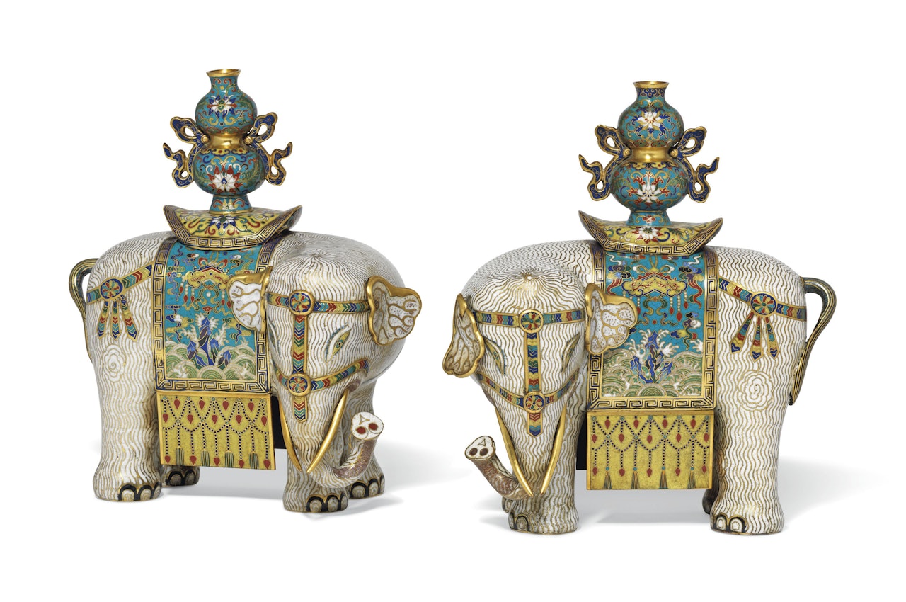 A PAIR OF CLOISONNÉ ENAMEL CAPARISONED ELEPHANTS by Anonymous