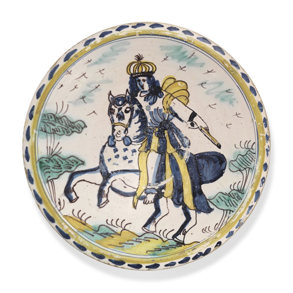 AN ENGLISH DELFT BLUE-DASH EQUESTRIAN PORTRAIT CHARGER by Anonymous