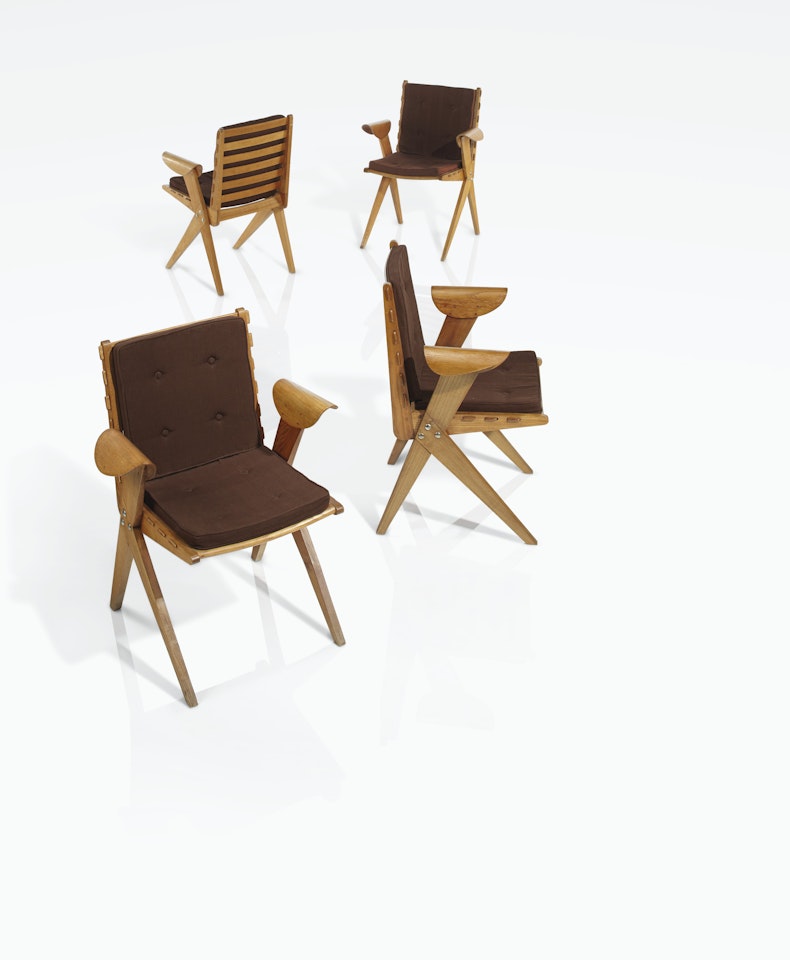 FOUR ARMCHAIRS by Pierre Jeanneret