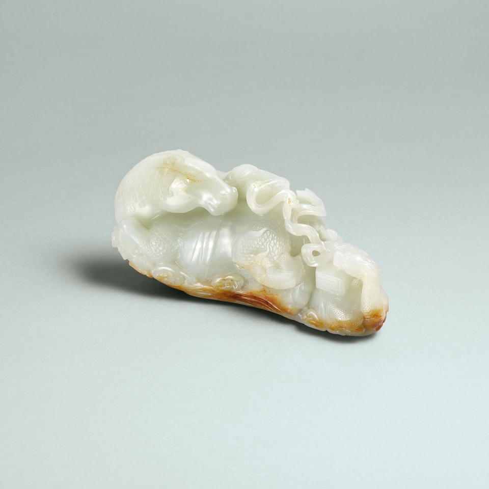 A RARE AND SUPERB WHITE JADE CARVING OF A DRAGON-HORSE by Anonymous