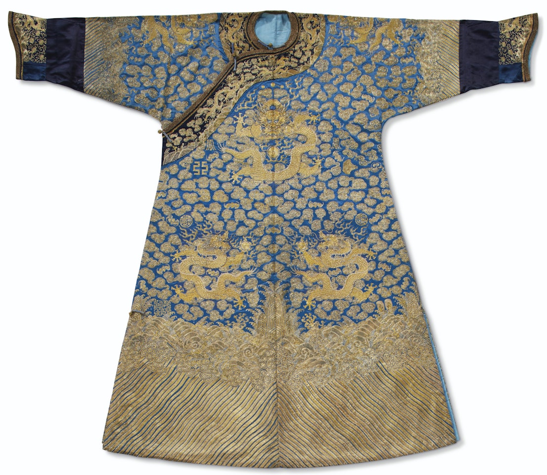 A RARE IMPERIAL GOLD AND SILVER-EMBROIDERED BLUE-GROUND TWELVE SYMBOL 'DRAGON' ROBE, LONGPAO by Anonymous
