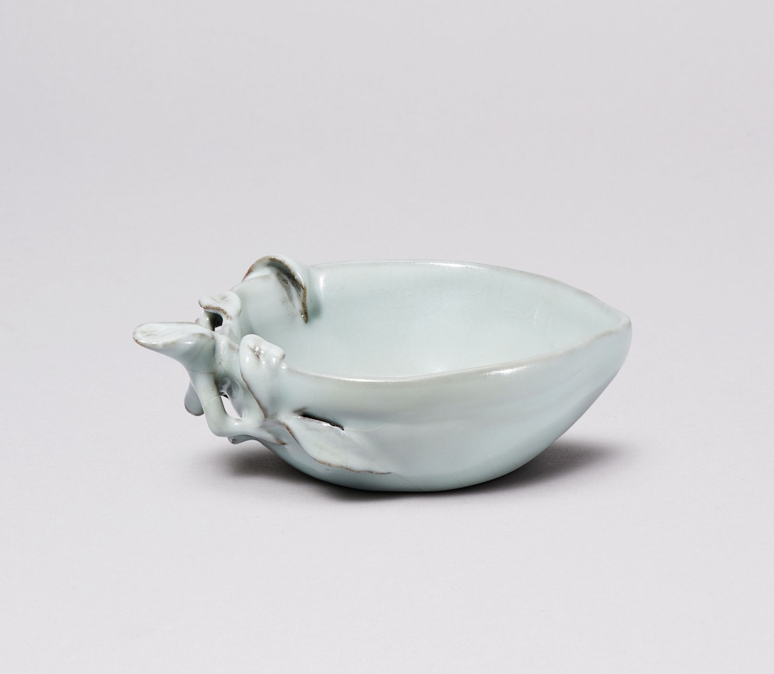 A GUAN-TYPE GLAZED PEACH-FORM WASHER by Anonymous