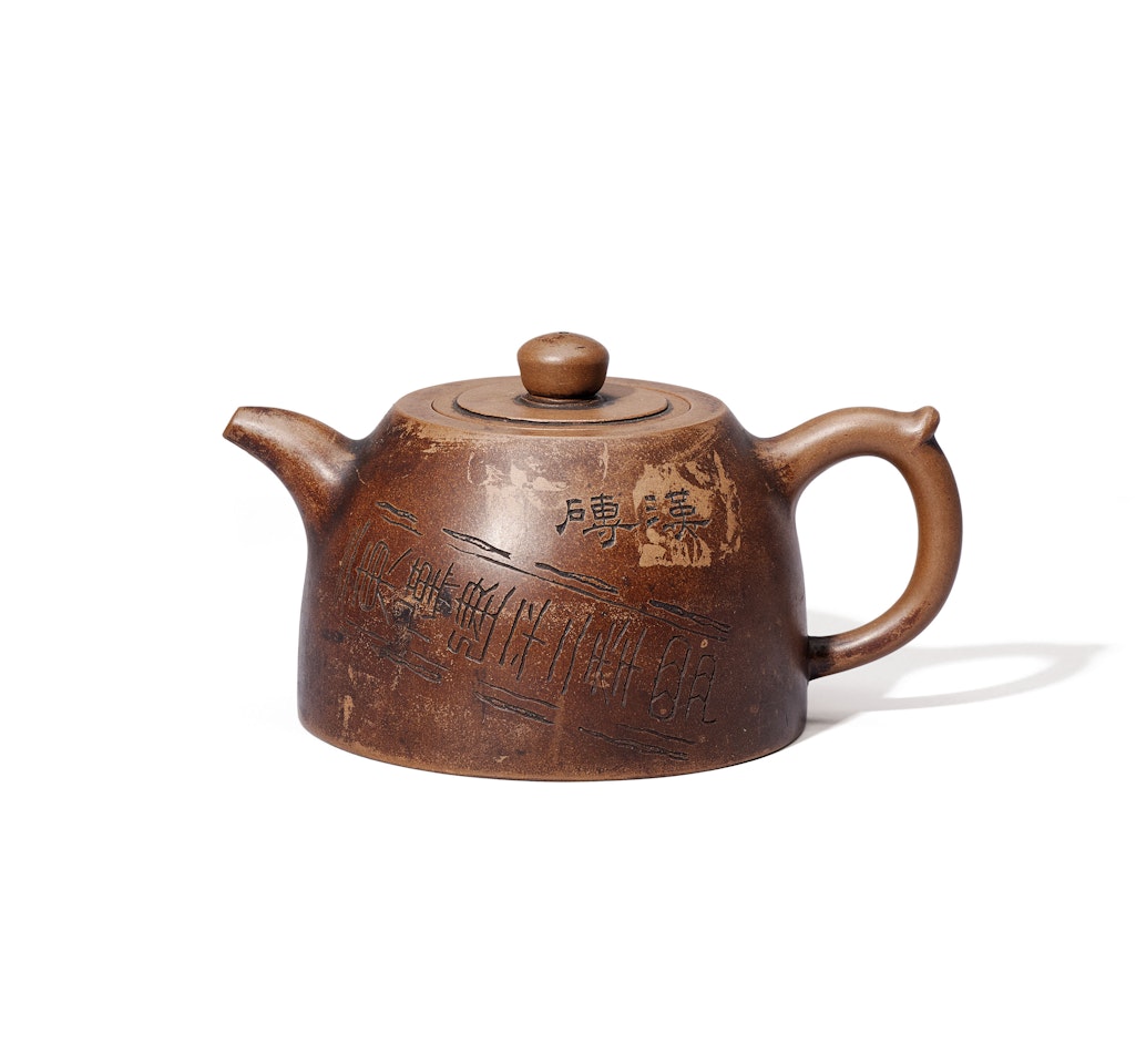 AN INSCRIBED YIXING TEAPOT AND COVER by Anonymous