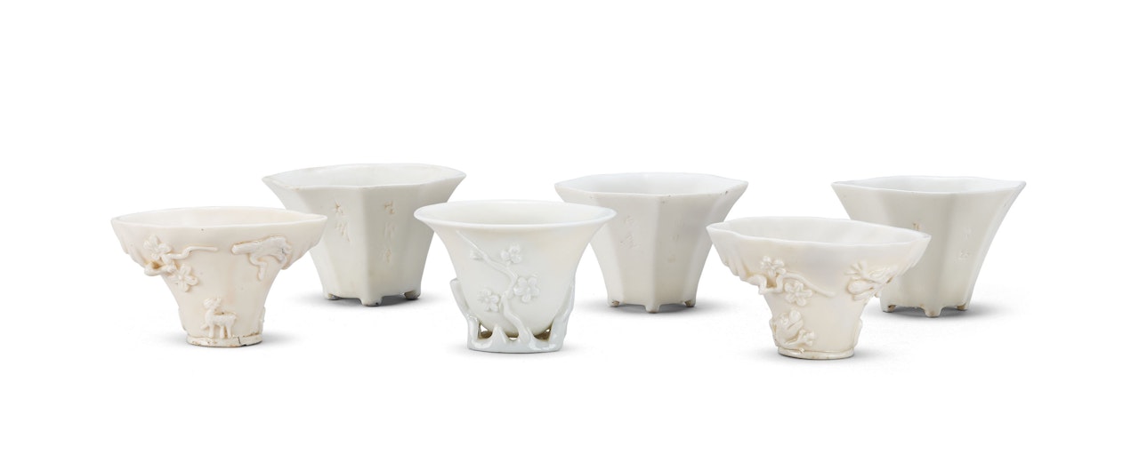 A GROUP OF SIX DEHUA CUPS by Anonymous