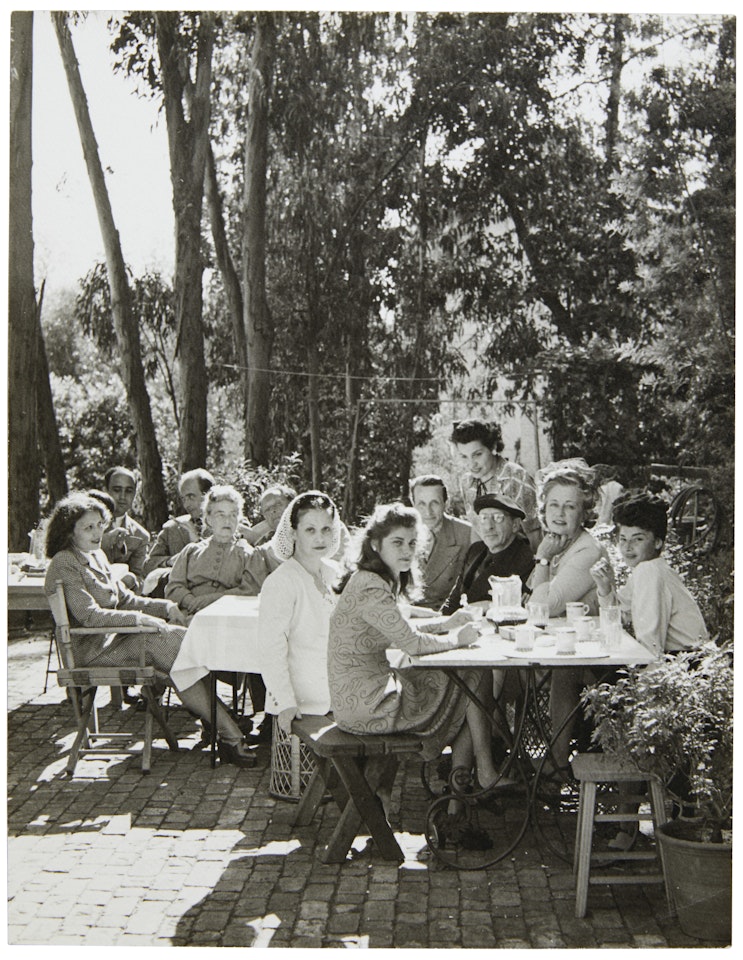 Stravinsky and others at a luncheon party (with Juliet Man Ray seated at extreme right), Los Angeles by Man Ray