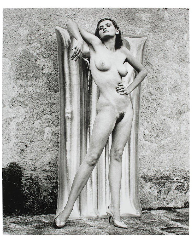 Nude with air mattress, Ramatuelle by Helmut Newton