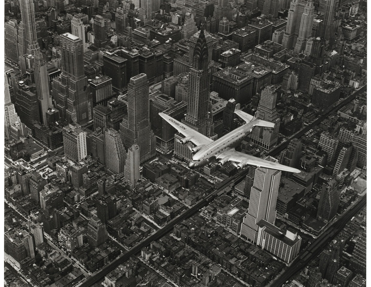 A DC-4 Flying Over New York City by Margaret Bourke-White