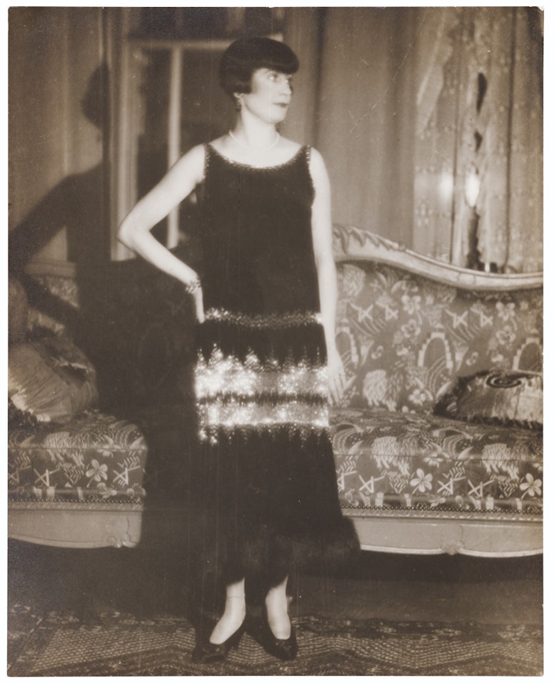 Untitled (Standing woman, interior scene) by Man Ray