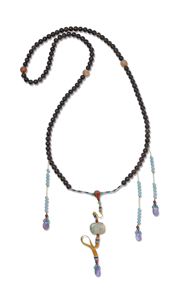 AN ALOESWOOD, JADEITE, AQUAMARINE AND AMETHYST COURT NECKLACE, CHAOZHU by Anonymous