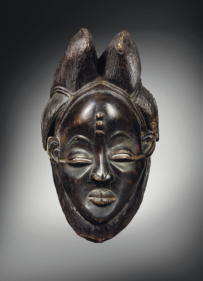 MASQUE NOIR PUNU, IKWARA
A PUNU MASK by Anonymous