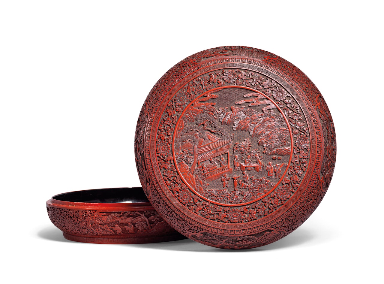 A CARVED CINNABAR LACQUER BOX AND COVER by Anonymous