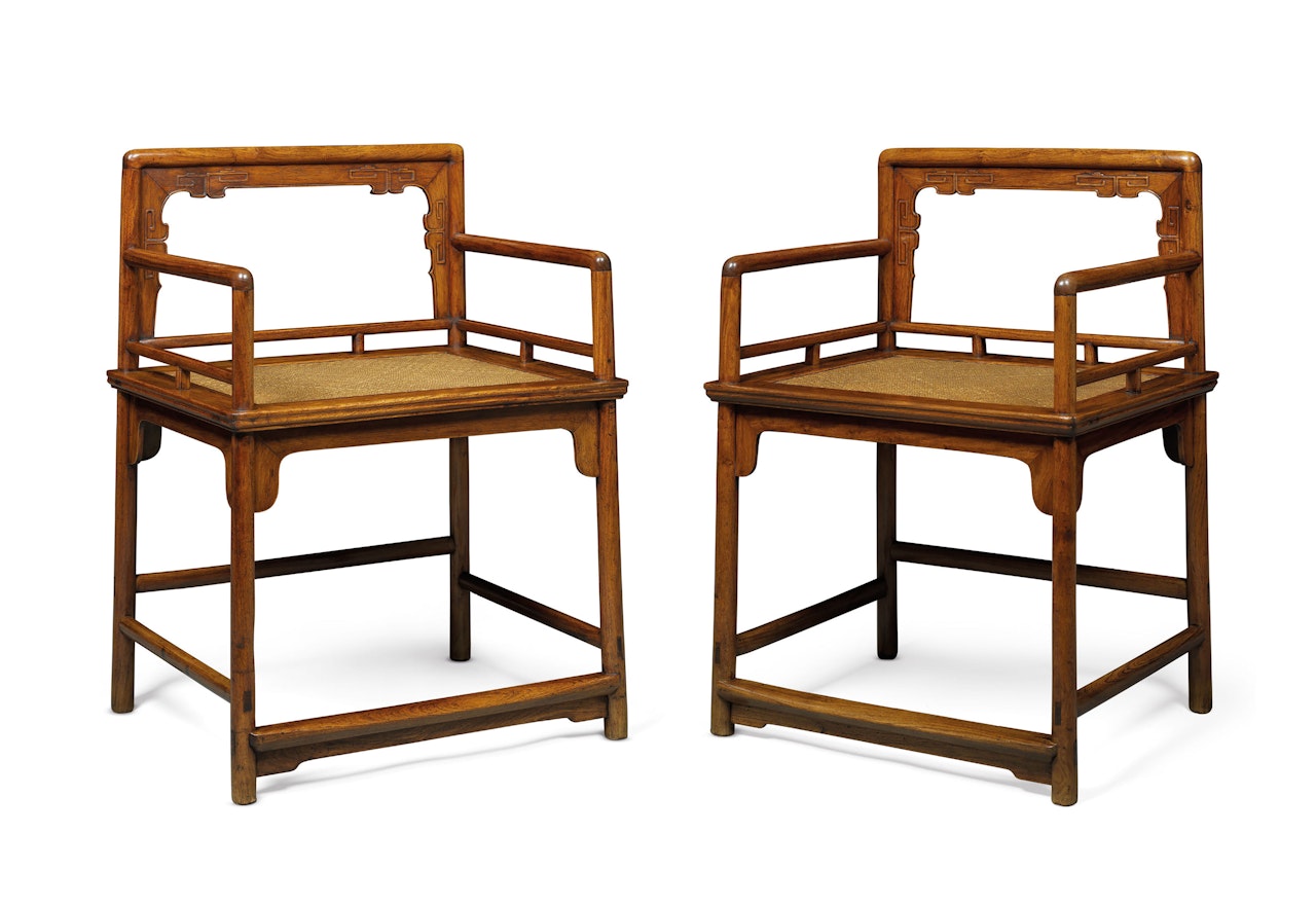 A PAIR OF HUANGHUALI LOWBACK ARMCHAIRS, MEIGUIYI by Anonymous