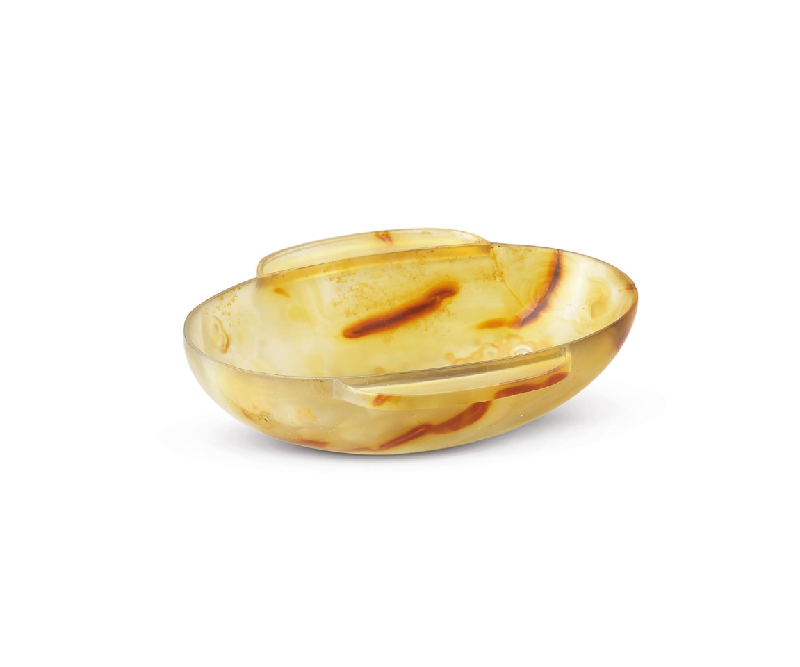 A RARE CARVED AGATE EAR CUP by Anonymous