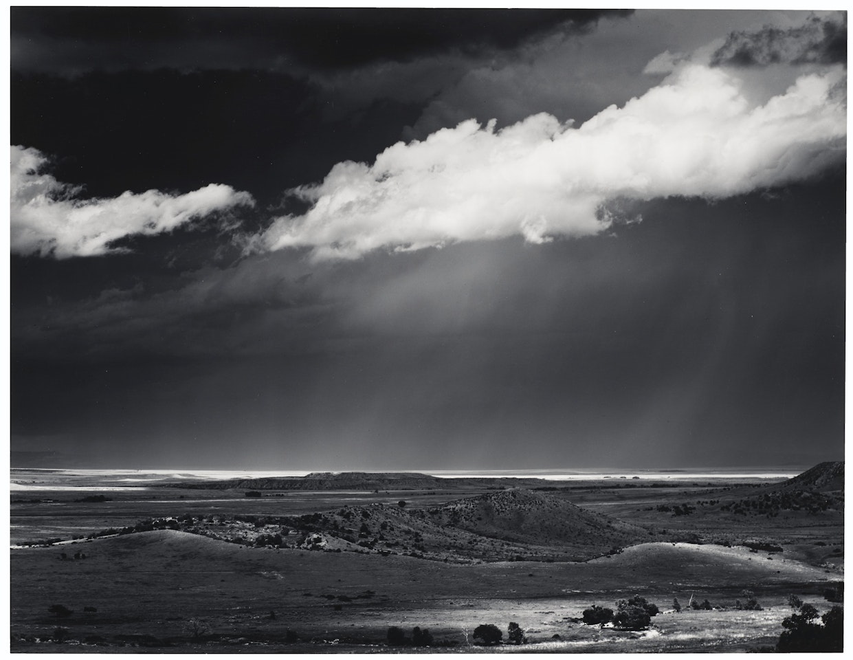 Thunderstorm over the Great Plains near Cimarron, New Mexico, c. 1961 by Ansel Adams