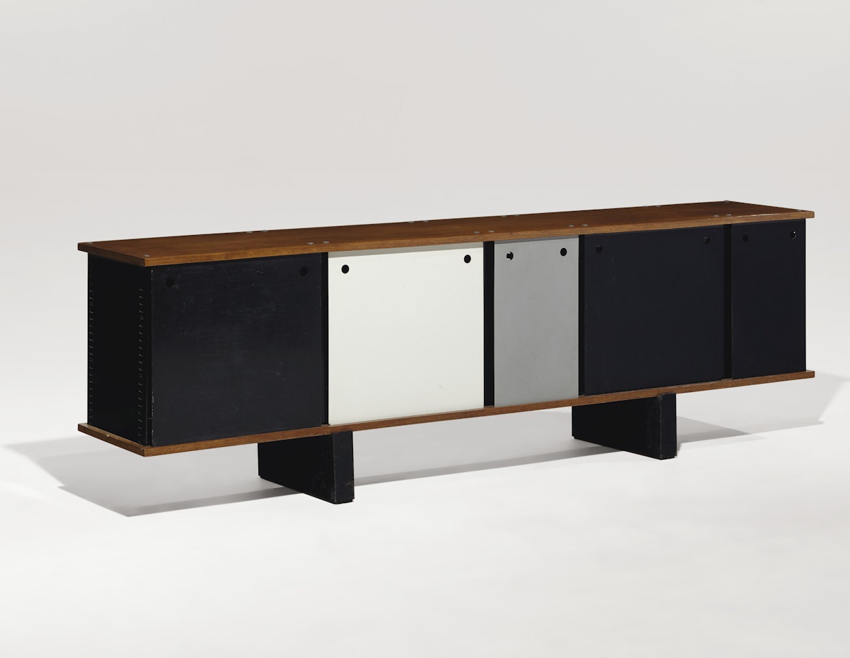 IMPORTANT ‘BAHUT’ SIDEBOARD, FROM THE CITÉ CANSADO, MAURITANIA by Charlotte Perriand
