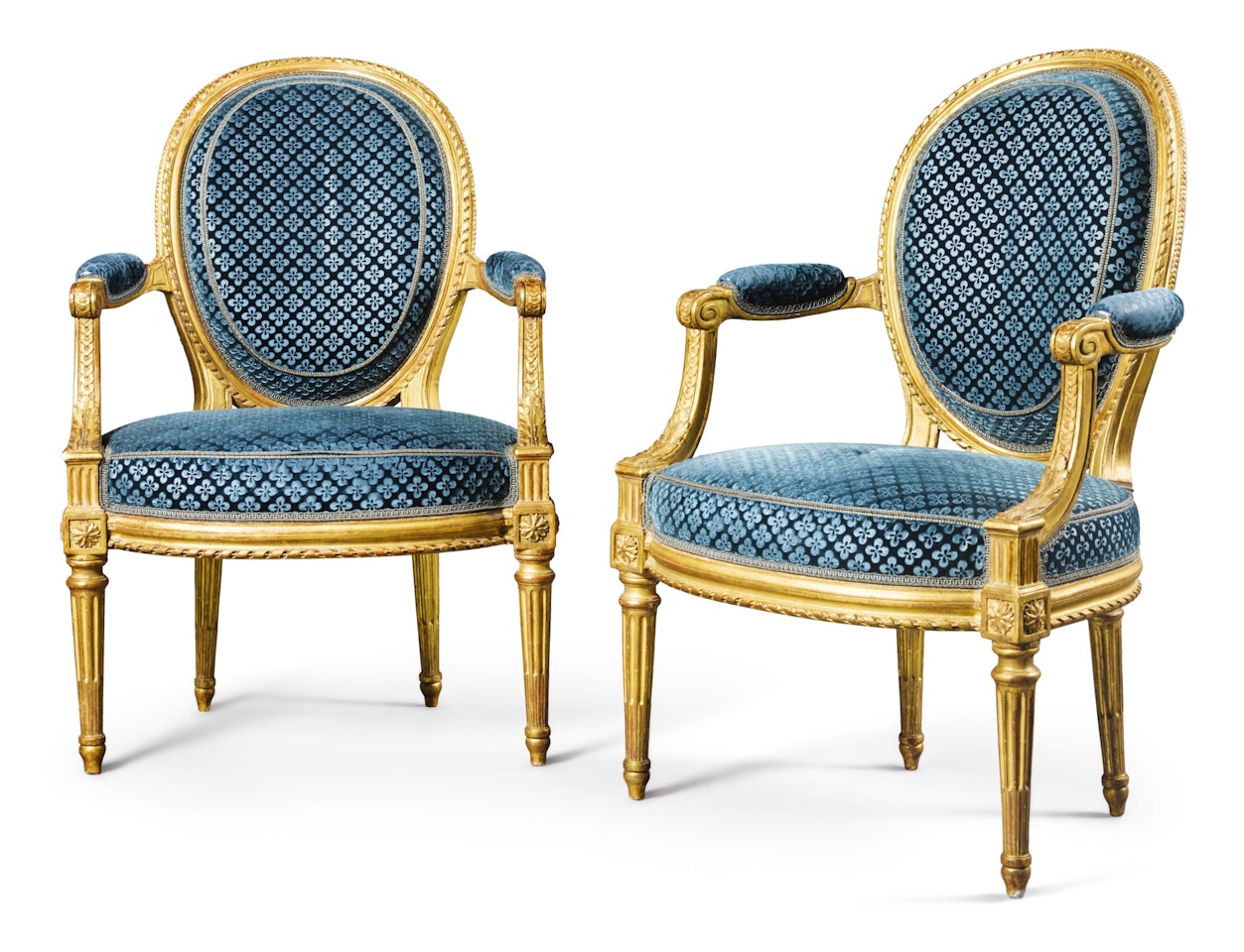 A pair of Louis XVI carved giltwood fauteuils by Louis Delanois by Anonymous