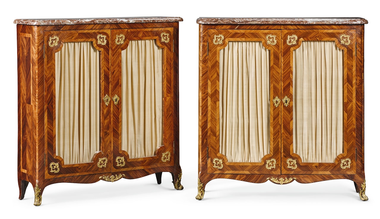 A pair of Louis XV kingwood, tulipwood and parquetry small bibliothèques by Pierre Migeon by Anonymous