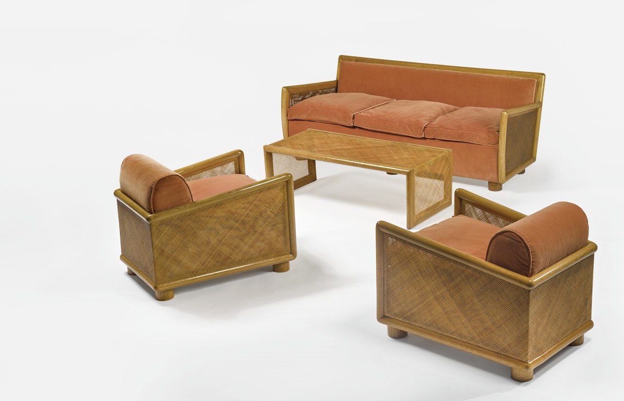 A FOUR-PIECE SUITE by Jean Royere